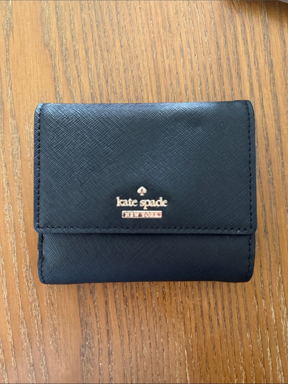 kate spade black saffiano trifold wallet with gold logo